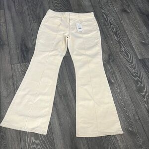 elegant Cream Flare Jeans MANGO